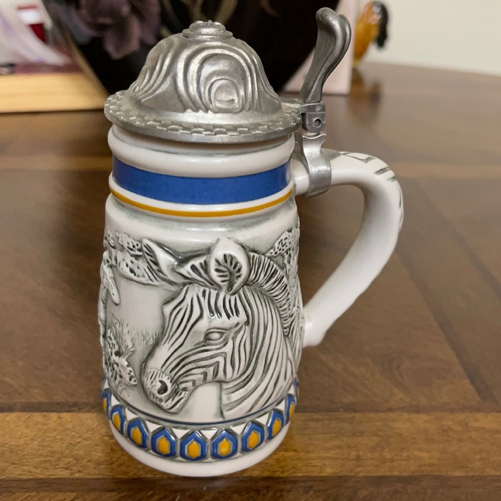 # 1128 Vintage Avon Ceramic Mug with metal lid.